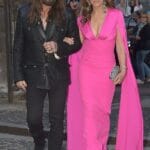 Elizabeth Hurley, 59, and Billy Ray Cyrus, 63, put on a loved up display as they make FIRST outing as a couple at swanky bash in Rome – after shocking the world with their unlikely romance