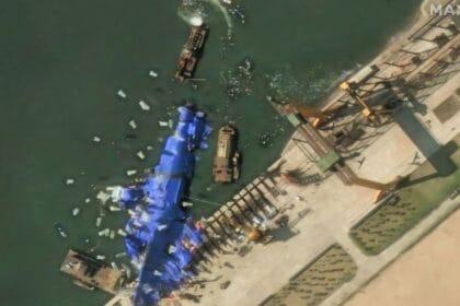 North Korea deploys mystery balloon-like objects to stricken warship, satellite photos show