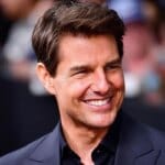 Tom Cruise and his love of speed celebrate with NASCAR fans on the 35th anniversary of one of his iconic films