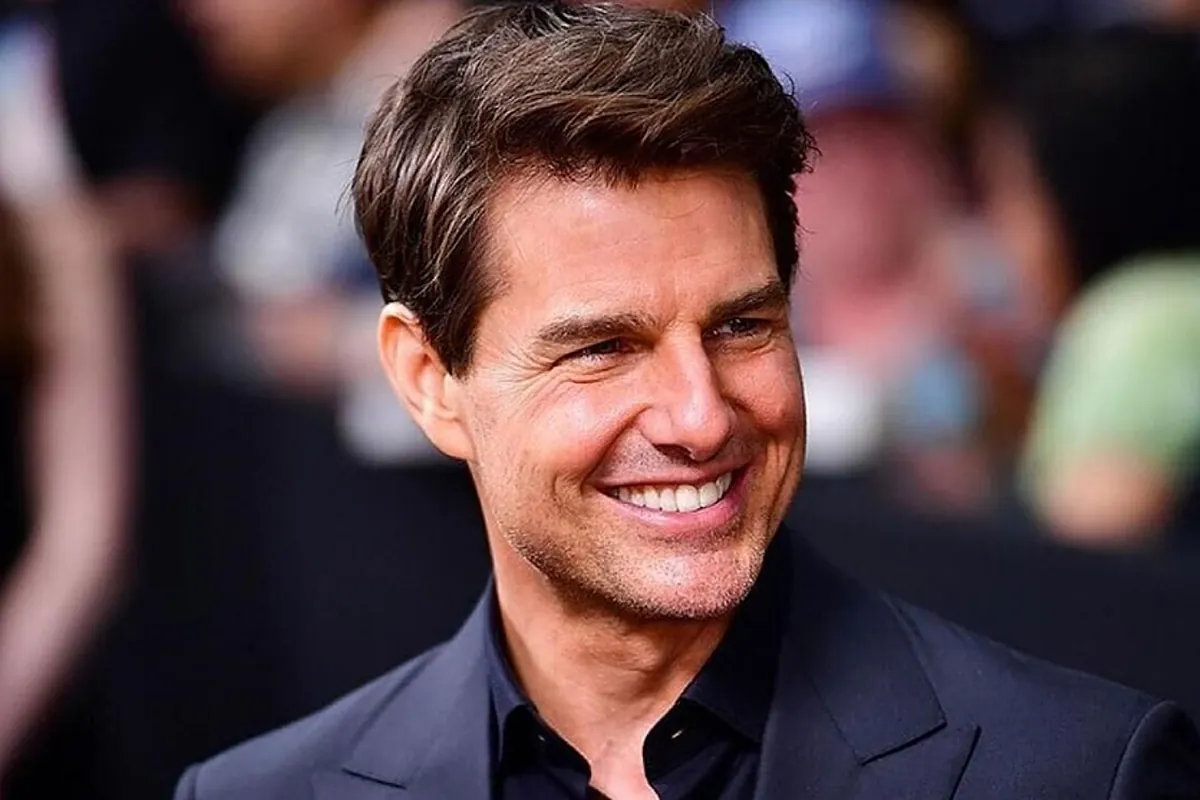 Tom Cruise and his love of speed celebrate with NASCAR fans on the 35th anniversary of one of his iconic films