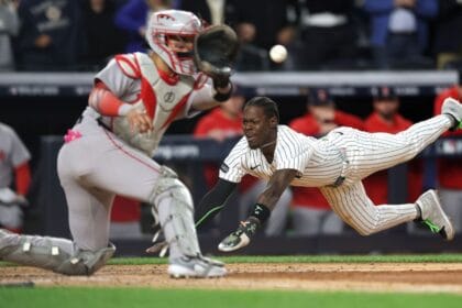 Chisholm turns page after benching, saves Yankees in Game 2