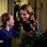 Catherine and Charlotte perform Christmas carol service piano duet