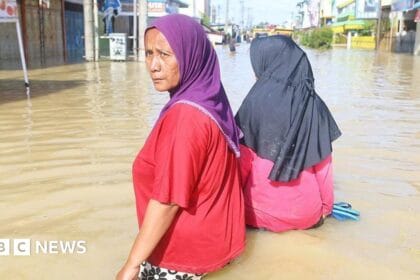 Desperate hunt for food and water as Indonesia floods death toll rises to 502