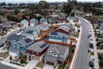 Home prices are poised to dip in 22 U.S. cities next year, a new analysis says. See where.