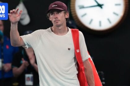 Alex de Minaur receives feedback from Carlos Alcaraz after Australian Open loss