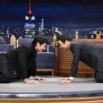 Hudson Williams Stretches, Teases Heated Rivalry Season 2 on Tonight Show