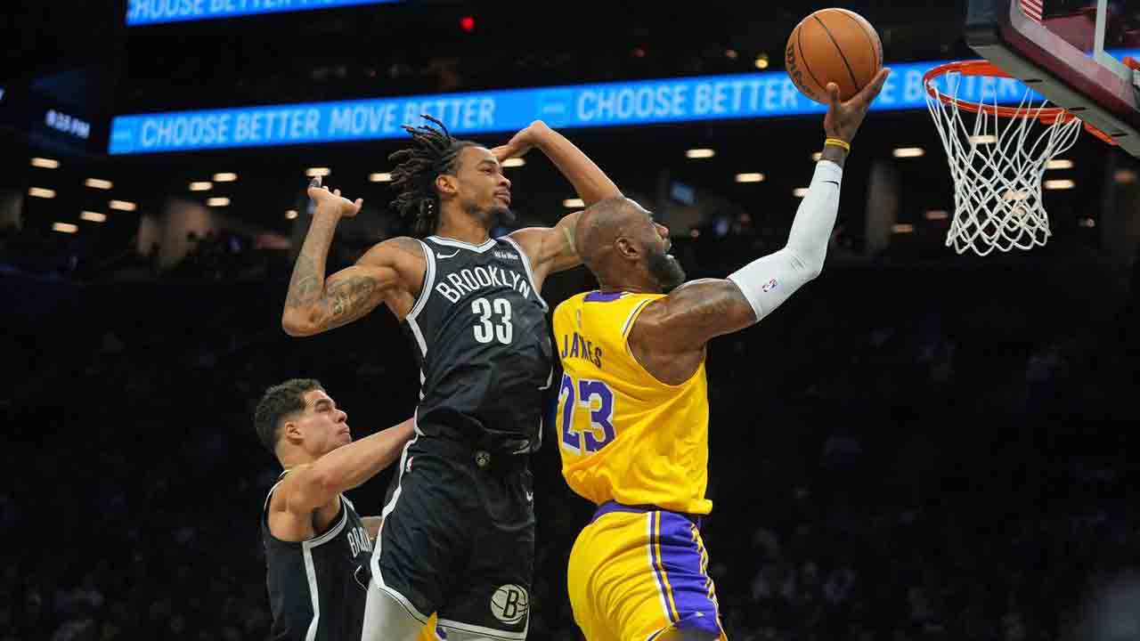 Doncic, James help Lakers rout Nets in Reaves’ return from injury