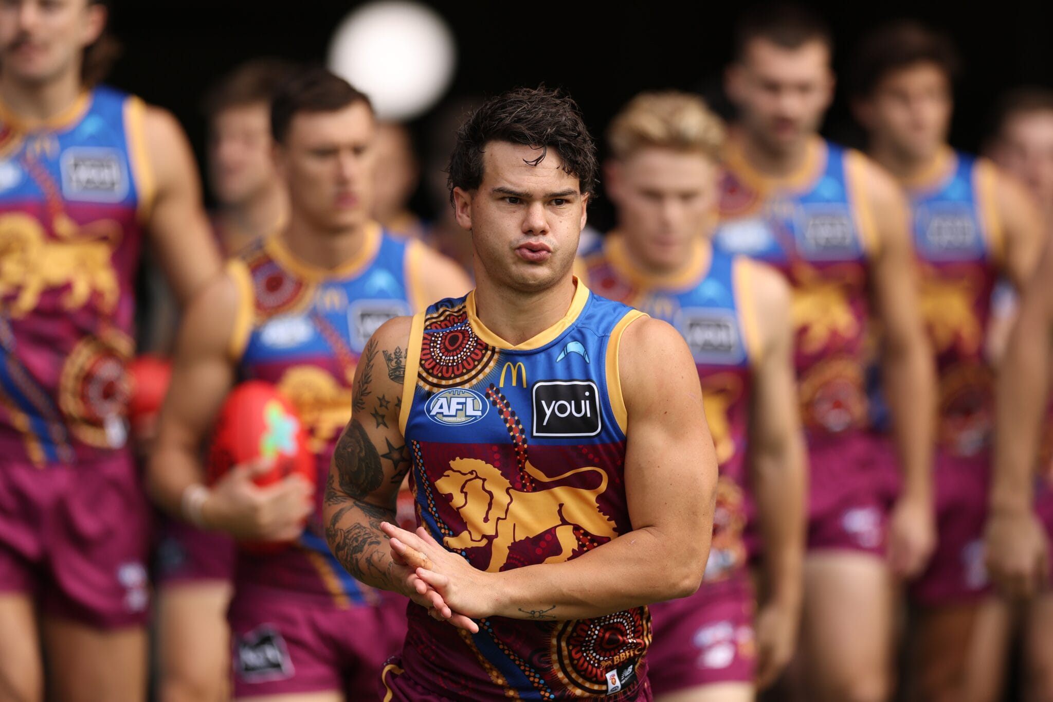 Lion cited for staging, Giant fined for strike