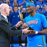 Shai Gilgeous-Alexander receives MVP trophy from NBA Commissioner Adam Silver