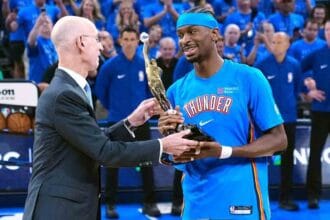 Shai Gilgeous-Alexander receives MVP trophy from NBA Commissioner Adam Silver