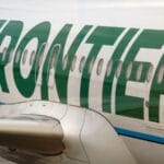 Frontier passenger chokes off-duty flight attendant after trying to open exit door and cockpit on Chicago flight, police say